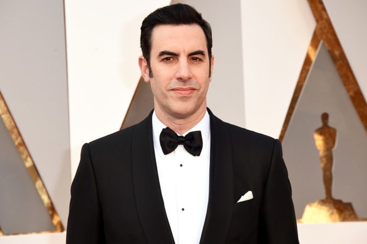 Sacha Baron Cohen Appears to Prank Conservative Rally, Performs Onstage: Watch